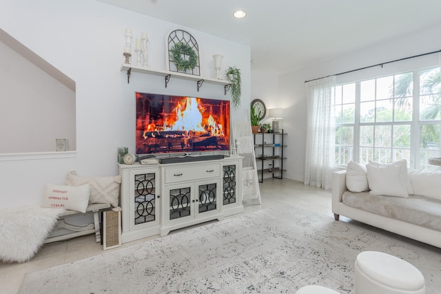 living room with tile patterned flooring