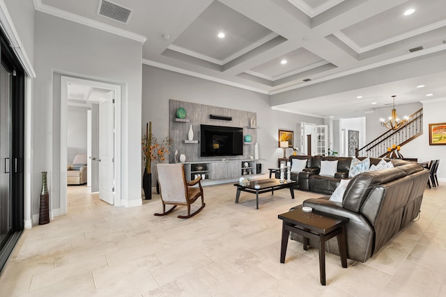 living room featuring coffered ceiling, beam ceiling, ornamental molding, and an inviting chandelier