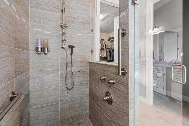 bathroom featuring an enclosed shower