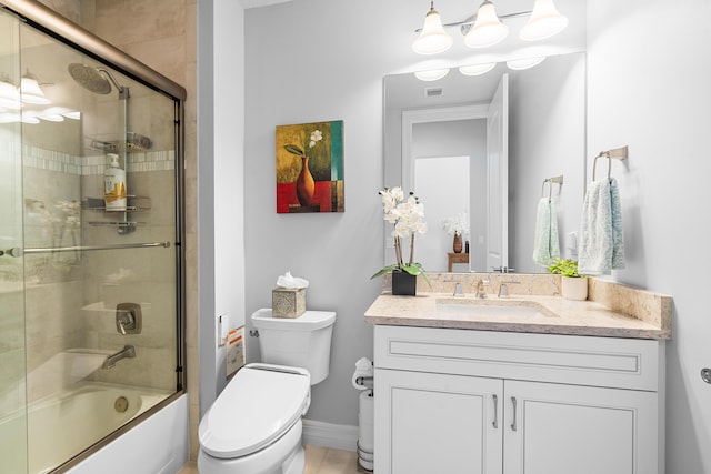 full bathroom with vanity, toilet, and enclosed tub / shower combo