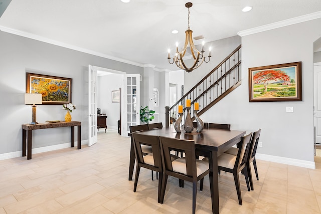 dining room featuring french doors, a notable chandelier, and ornamental molding