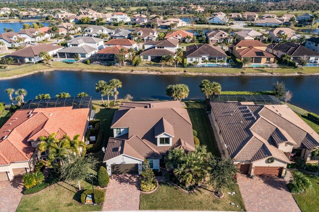 drone / aerial view with a water view