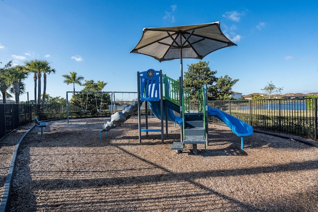 community jungle gym with fence