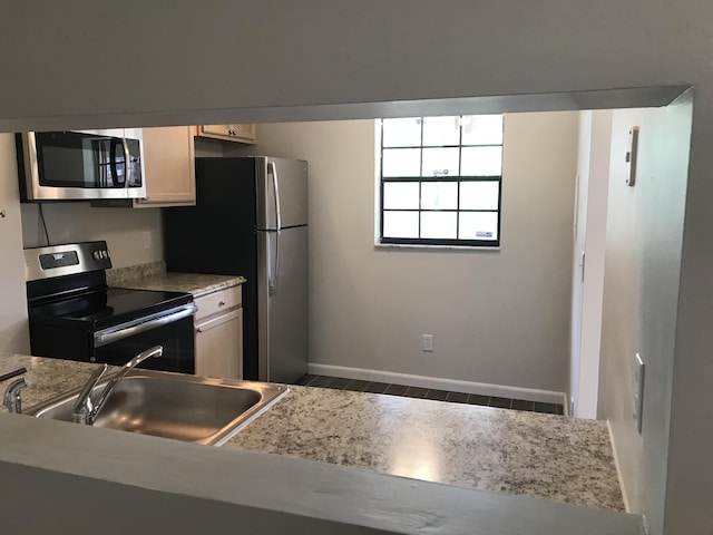 kitchen with sink and stainless steel appliances