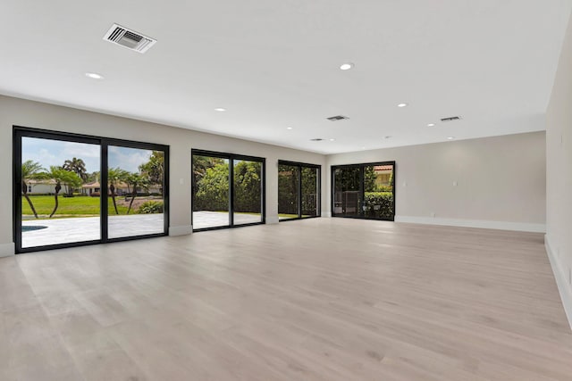 empty room with light wood-type flooring