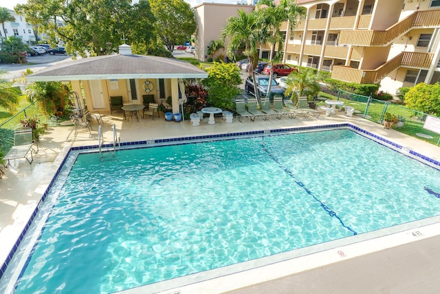 view of pool featuring a patio area