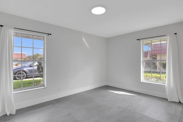 unfurnished room with a wealth of natural light