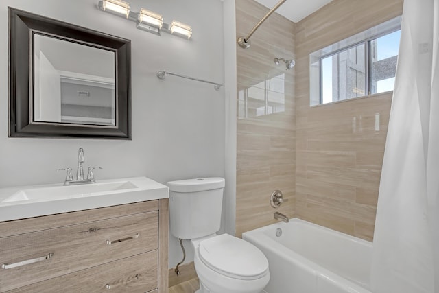 full bathroom with shower / bath combo, toilet, and vanity