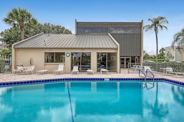 view of pool featuring a patio area