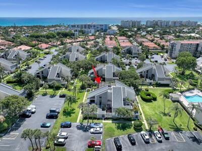 bird's eye view with a water view