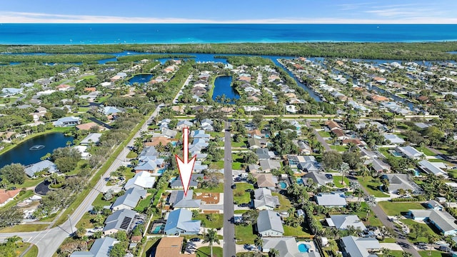 drone / aerial view featuring a water view