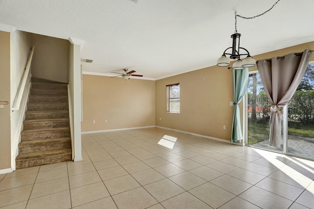 901 SW 15th St, Deerfield Beach, FL 33441 - spare room with crown molding, light tile patterned floors, a chandelier, stairway, and baseboards