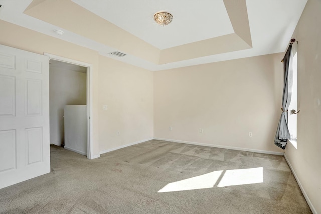901 SW 15th St, Deerfield Beach, FL 33441 - carpeted empty room featuring baseboards and a raised ceiling