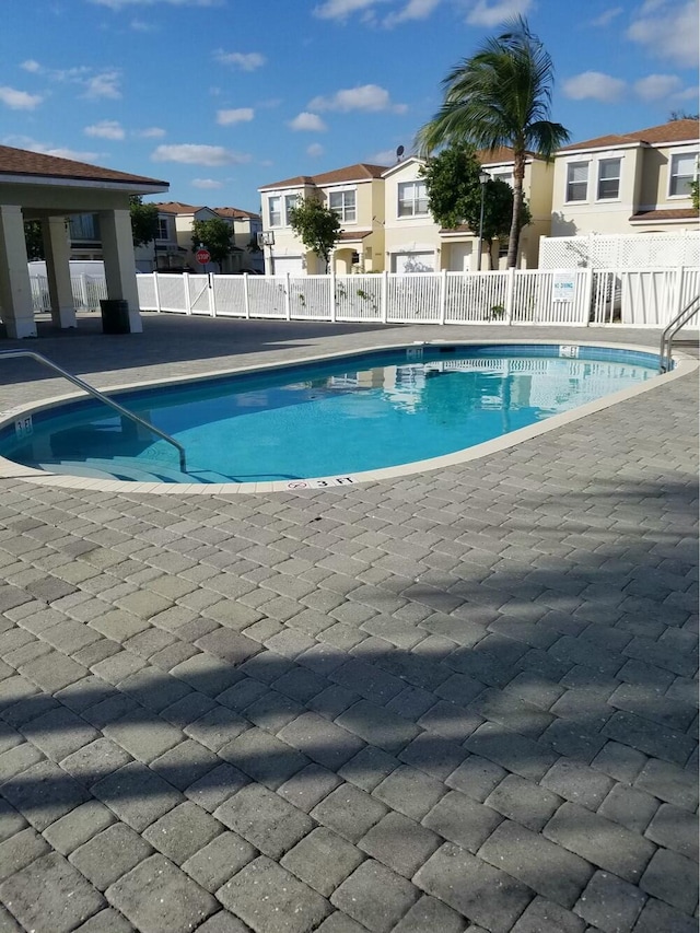 view of pool featuring a patio