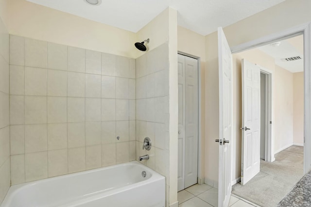 901 SW 15th St, Deerfield Beach, FL 33441 - full bath featuring shower / bathtub combination, a closet, tile patterned flooring, and baseboards