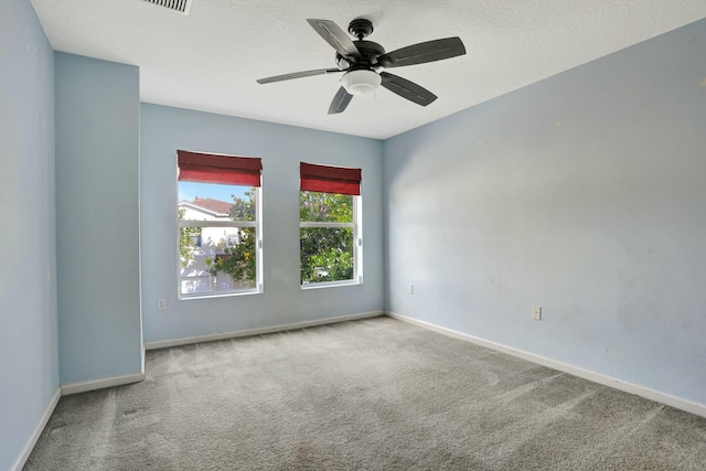 901 SW 15th St, Deerfield Beach, FL 33441 - spare room featuring carpet flooring, baseboards, and ceiling fan