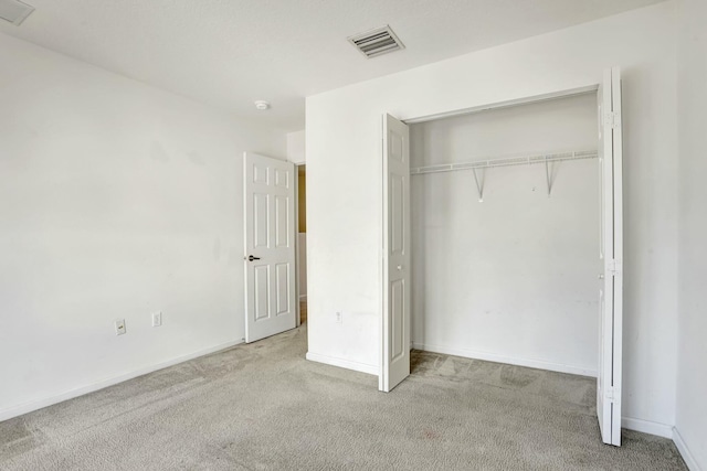 901 SW 15th St, Deerfield Beach, FL 33441 - unfurnished bedroom with carpet flooring, a closet, and baseboards