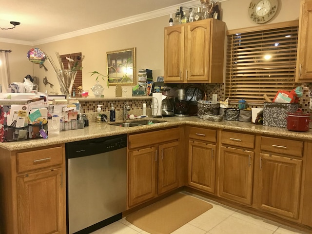 kitchen with crown molding, sink, stainless steel dishwasher, tasteful backsplash, and light tile patterned flooring