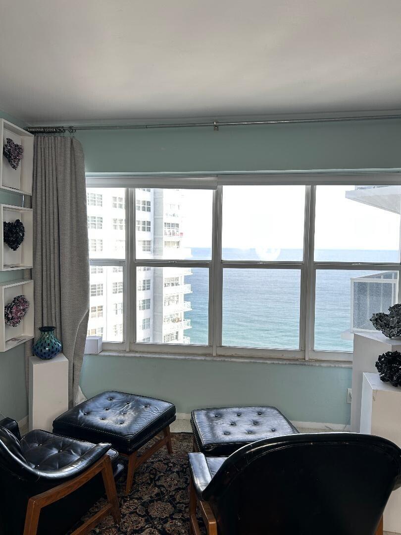 sitting room with a water view