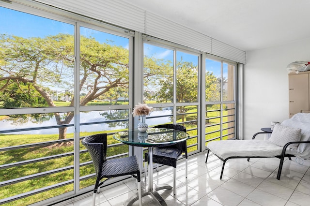 sunroom with a water view