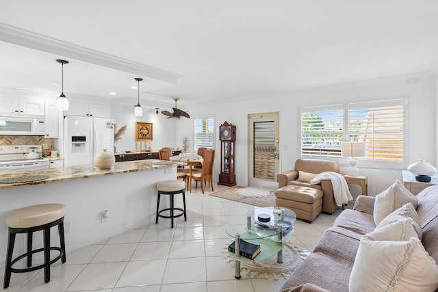 tiled living room with crown molding