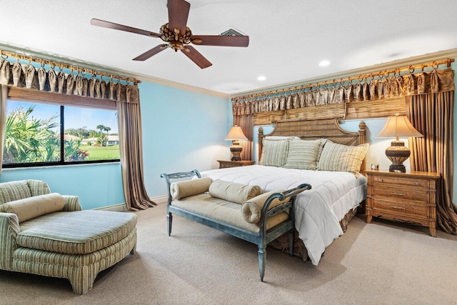 bedroom featuring ceiling fan, crown molding, and light carpet