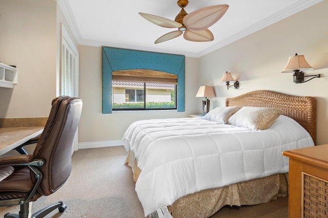 carpeted bedroom featuring ceiling fan and ornamental molding