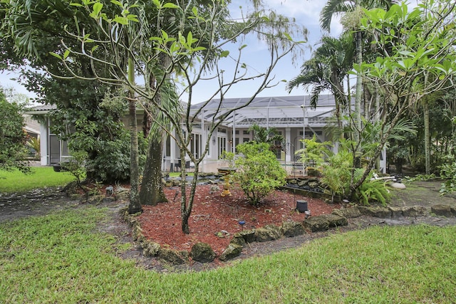 view of yard featuring a lanai