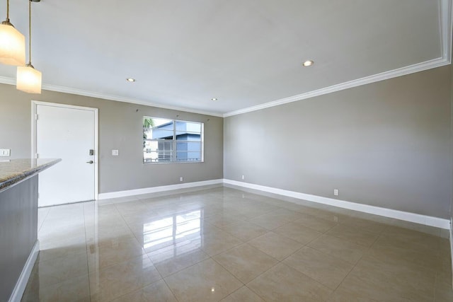 spare room featuring ornamental molding