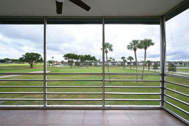 267 Normandy F, Delray Beach, FL 33484 - sunroom / solarium featuring ceiling fan