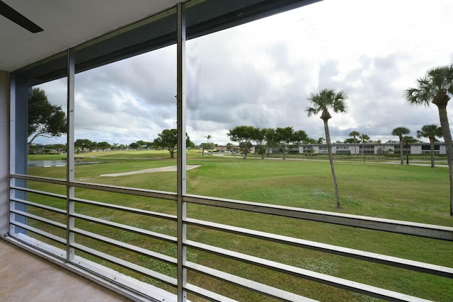 267 Normandy F, Delray Beach, FL 33484 - unfurnished sunroom featuring golf course view