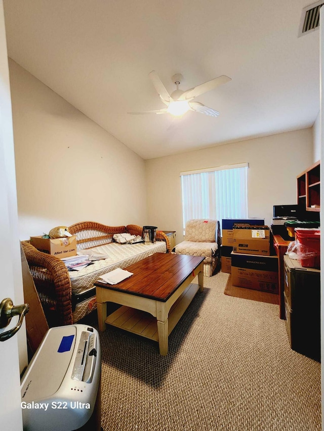 carpeted bedroom featuring ceiling fan