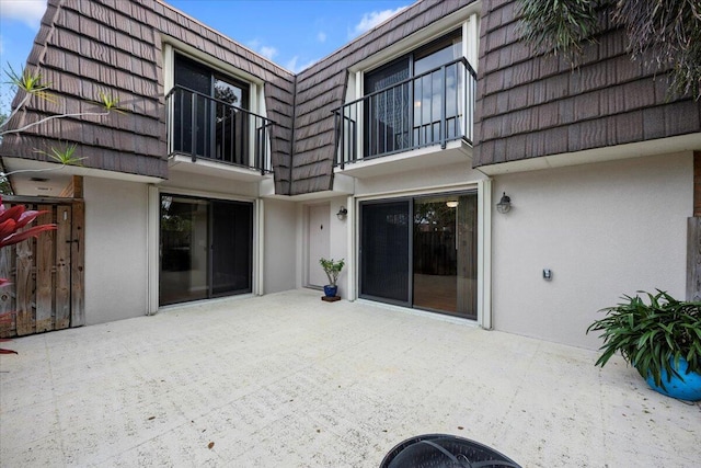 rear view of house featuring a patio area