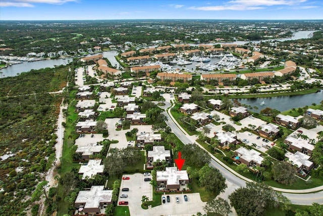 bird's eye view with a water view