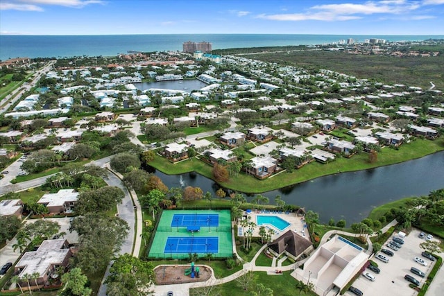 birds eye view of property featuring a water view