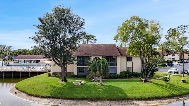 view of front of property with a front lawn