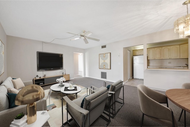 living room featuring ceiling fan