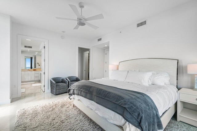 bedroom with ceiling fan and ensuite bath