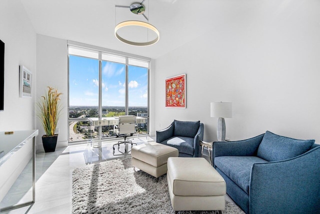 living room with a wall of windows