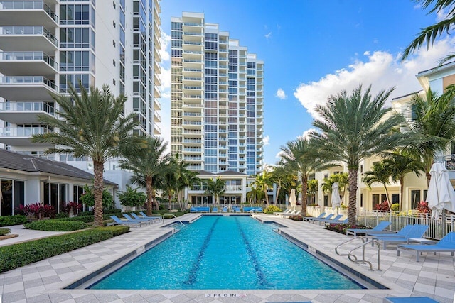 view of swimming pool with a patio area