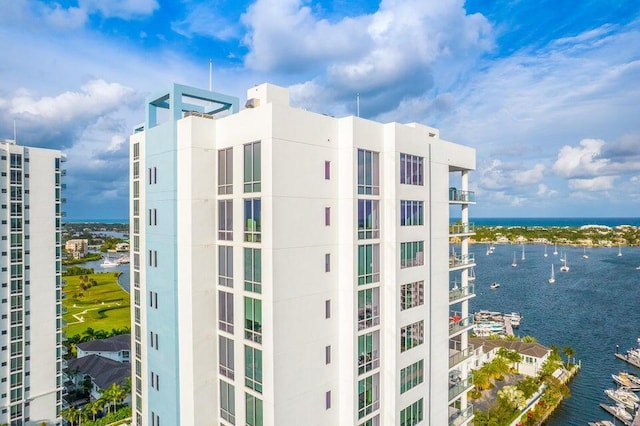 view of building exterior featuring a water view