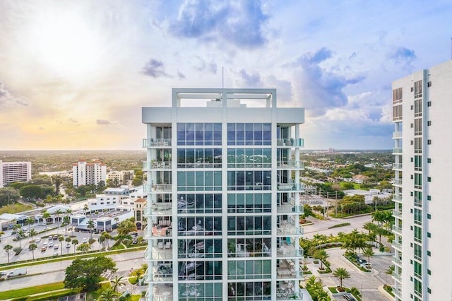 view of outdoor building at dusk