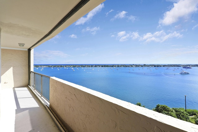 balcony featuring a water view