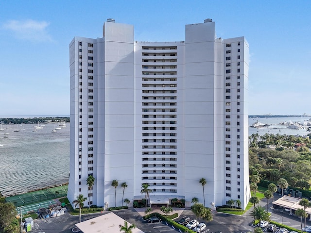 view of building exterior with a water view