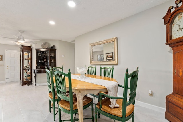 dining space with ceiling fan