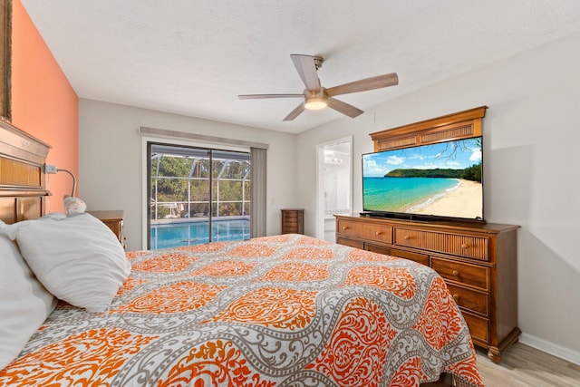 bedroom featuring access to exterior, a textured ceiling, light wood-type flooring, and ceiling fan