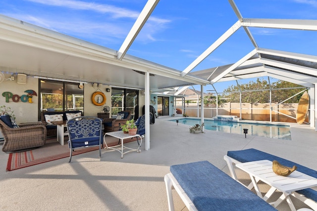 view of patio featuring glass enclosure and a fenced in pool