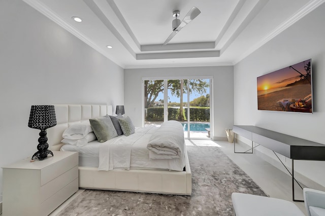 bedroom with ceiling fan, crown molding, access to outside, and a tray ceiling