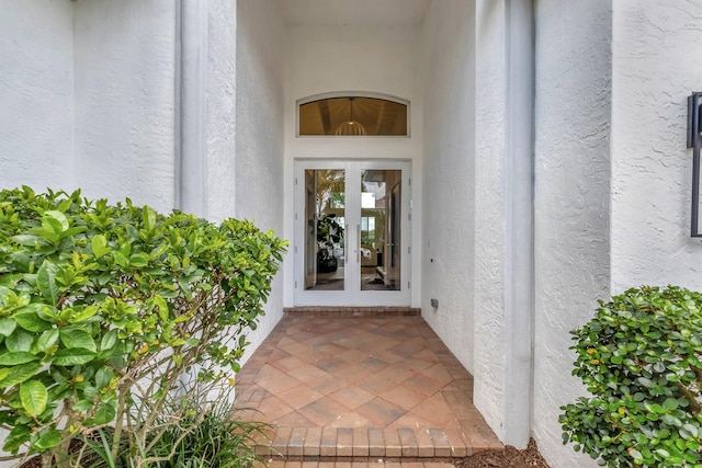 property entrance featuring french doors