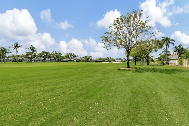 view of home's community featuring a lawn